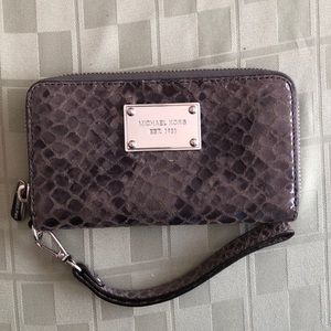 Michael Kors snakeskin wristlet.
